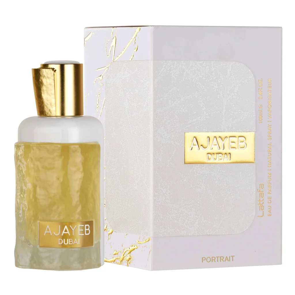 Ajayeb Dubai Portrait parfumfles met gouden en witte details naast doos