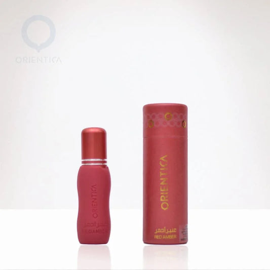 Twee rode parfumflesjes van Orientica Rood Amber 6ml, één met dop en in doosje